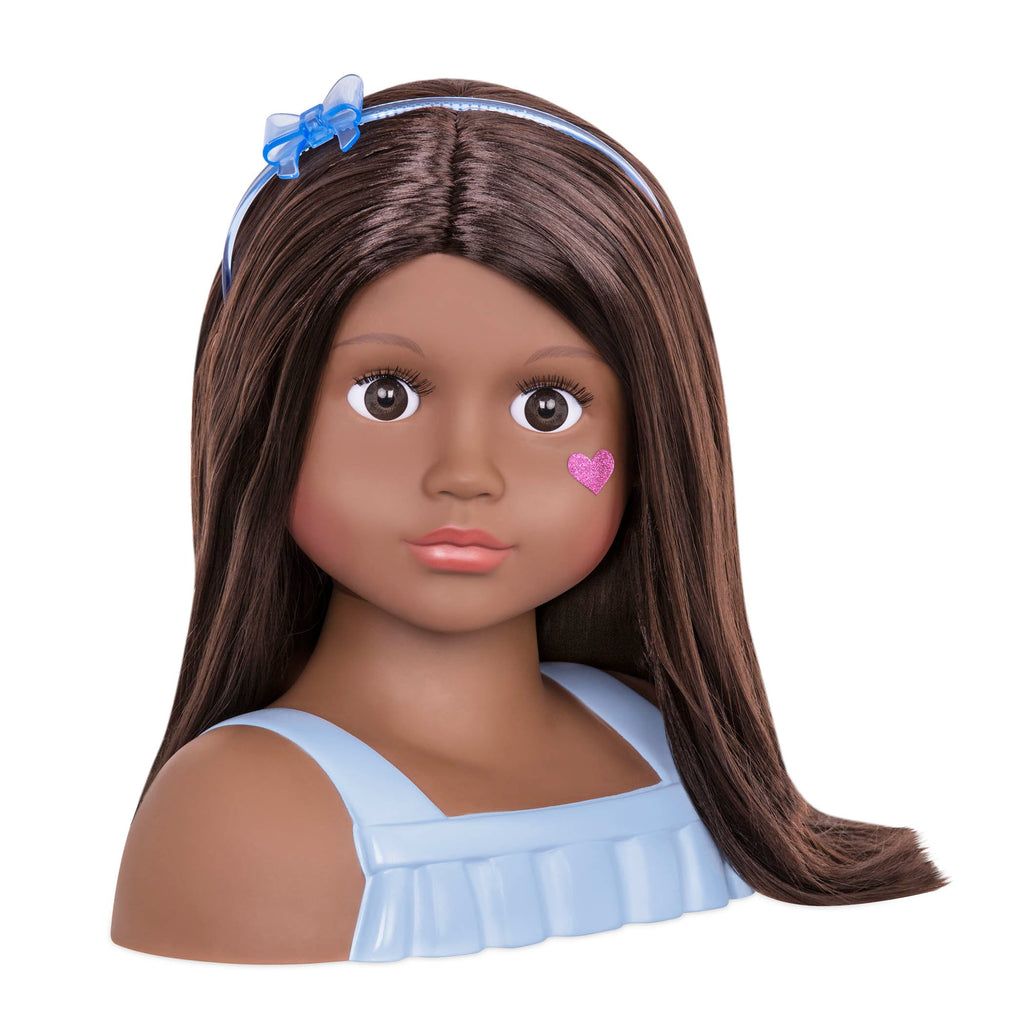Brunette doll styling head with hair accessories