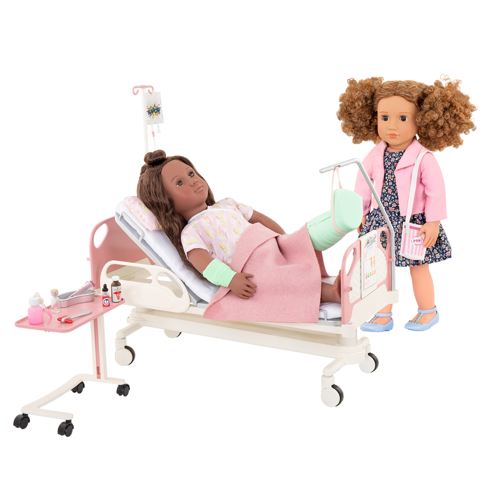 Two 18-inch dolls with hospital gurney playset