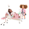Two 18-inch dolls with hospital gurney playset