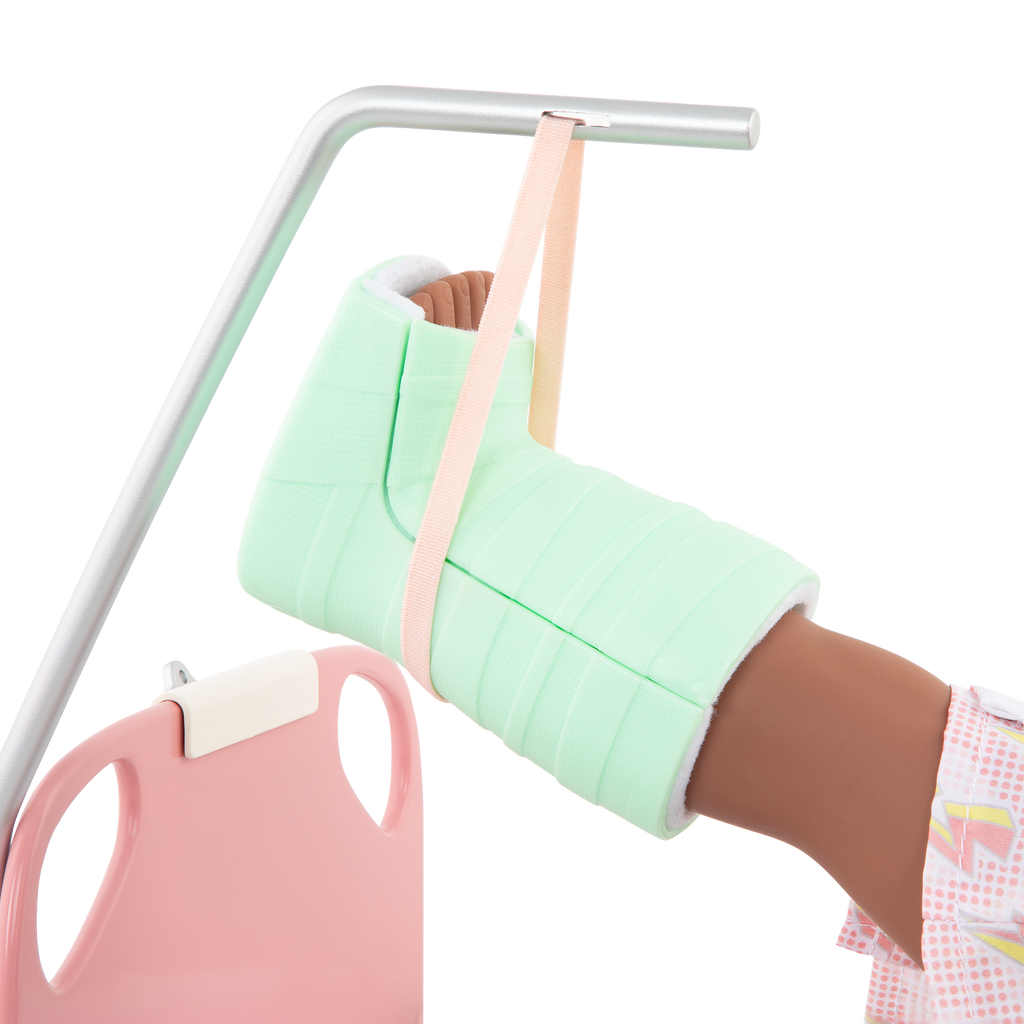 Two 18-inch dolls with hospital gurney playset