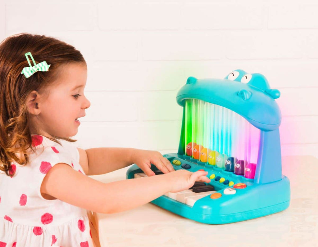 Hippo-shaped play piano for kids with 8 colourful birds.