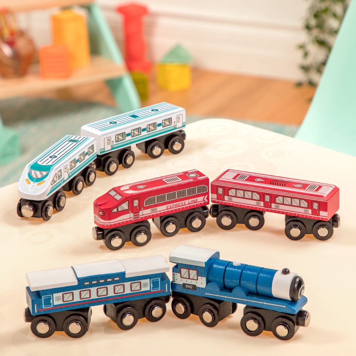 B. toys - Wooden Trains Asst