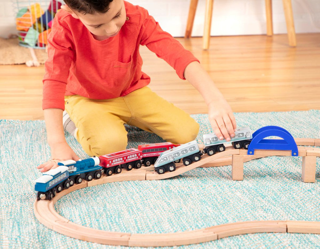 B. toys - Wooden Trains Asst