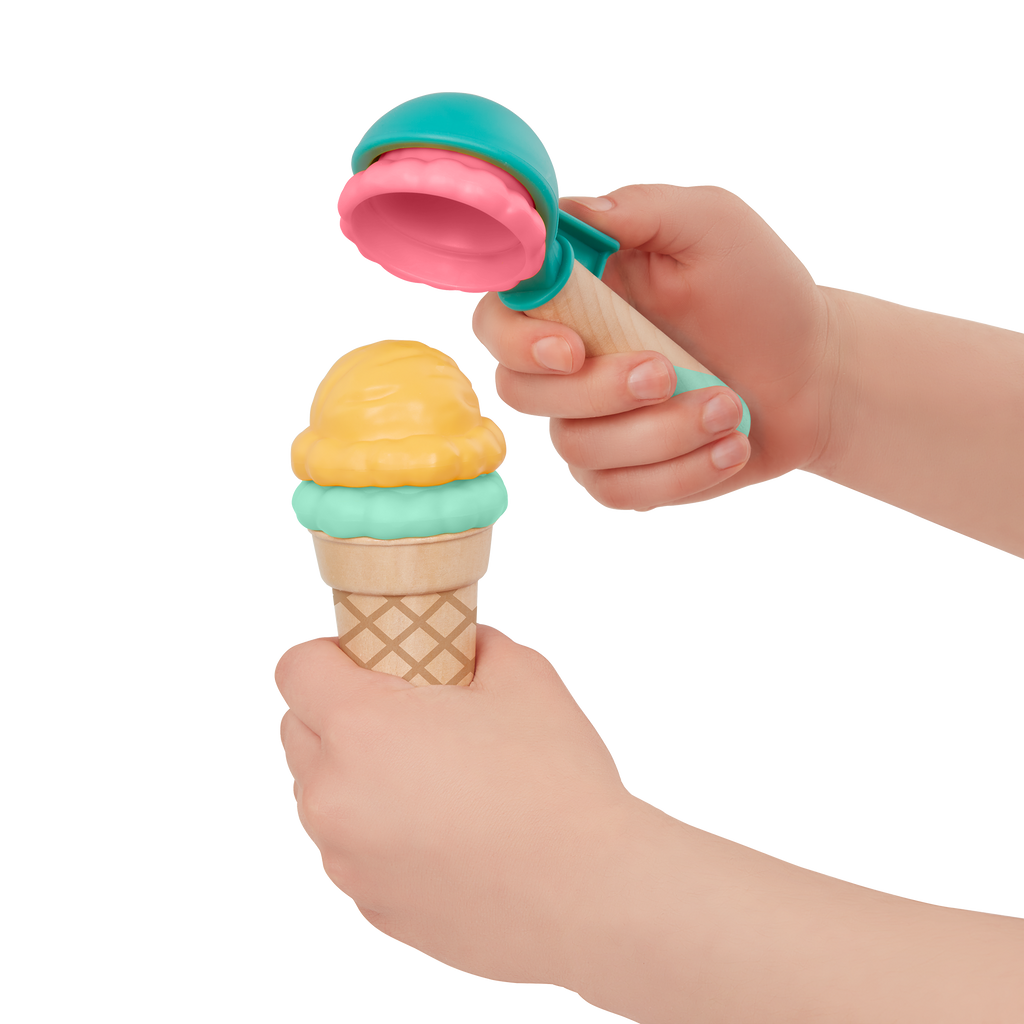 Toy ice cream truck with scoops.