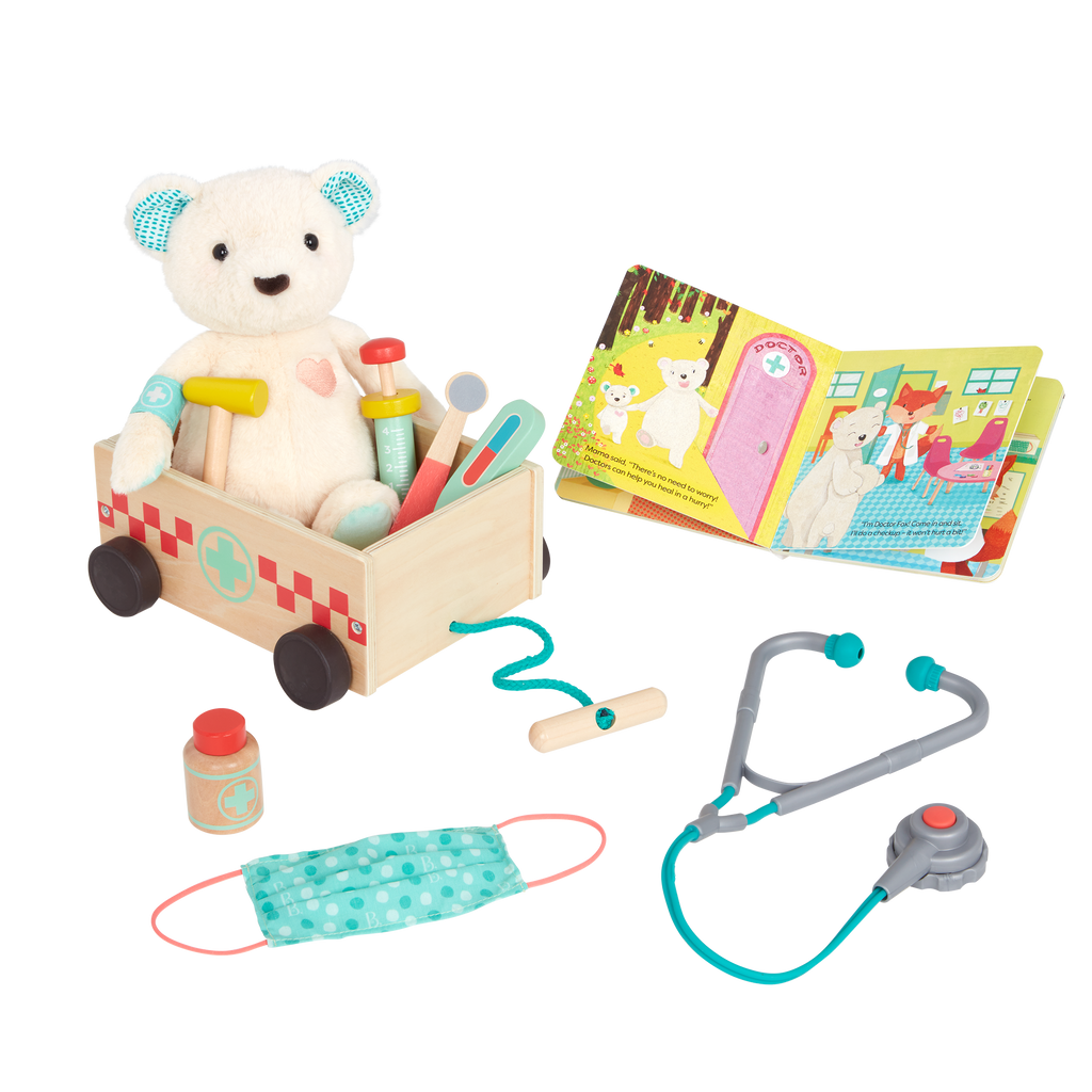 Teddy bear with book, wagon and wooden doctor tools for kids.