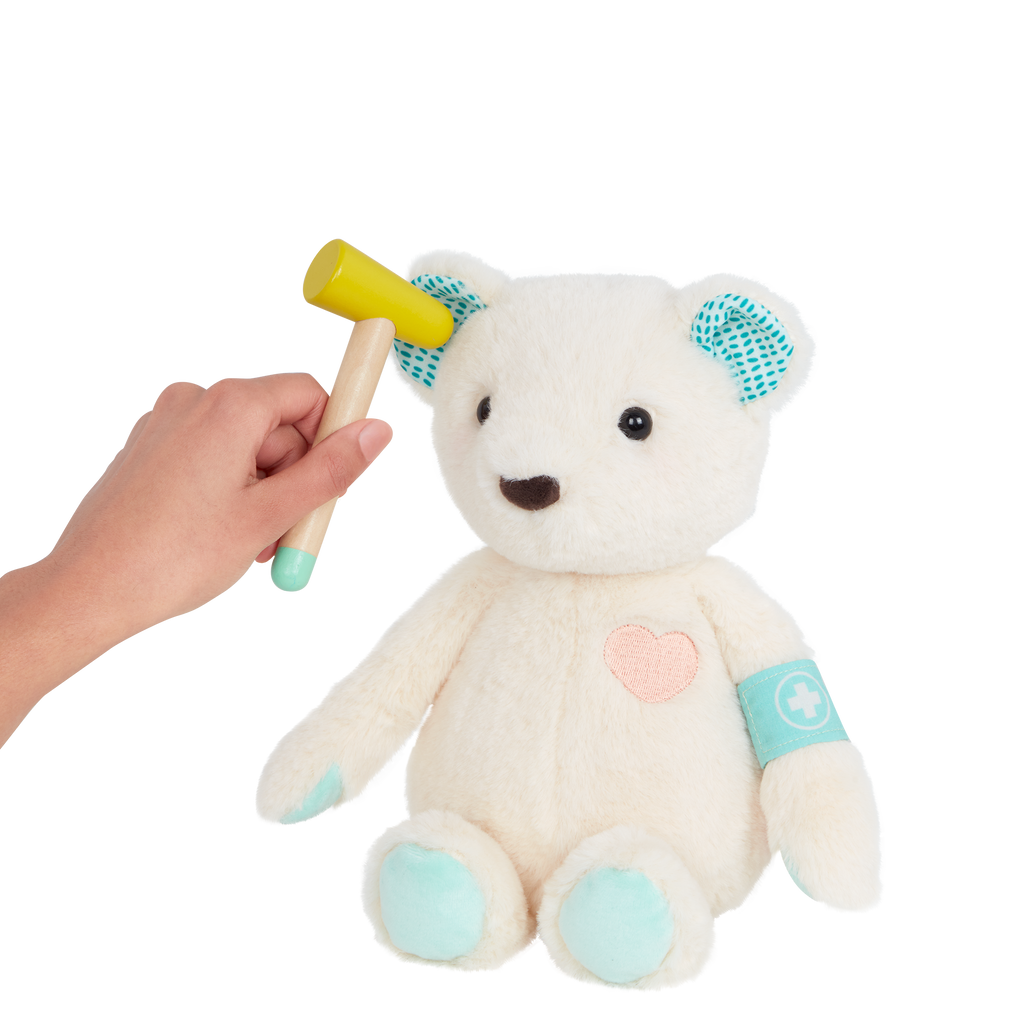Teddy bear with book, wagon and wooden doctor tools for kids.