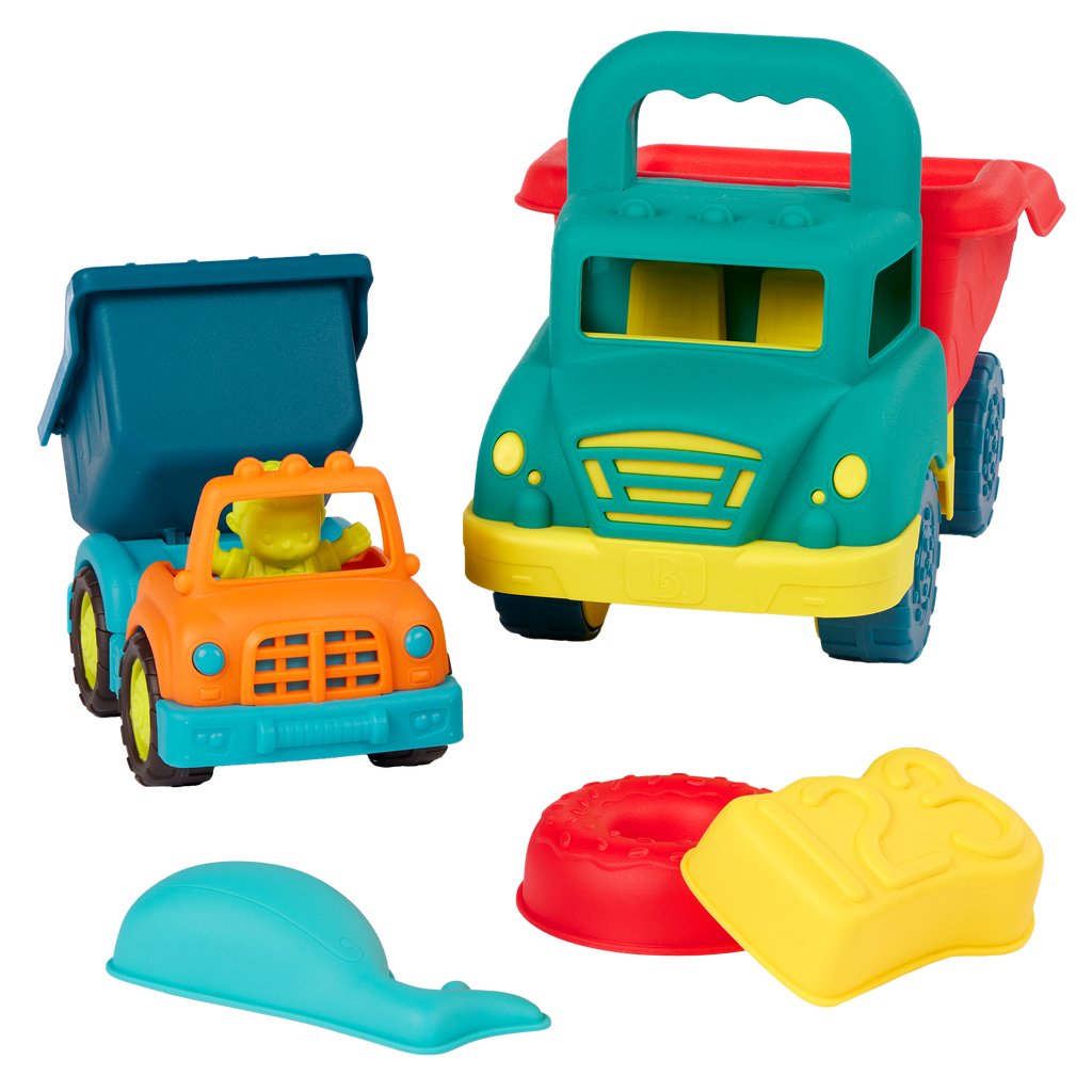 Toy dump trucks with sand molds