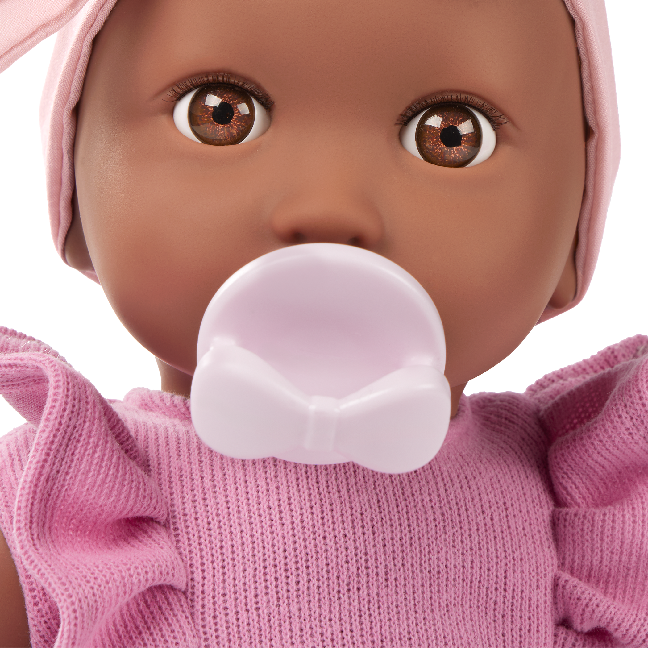 LullaBaby doll in purple romper