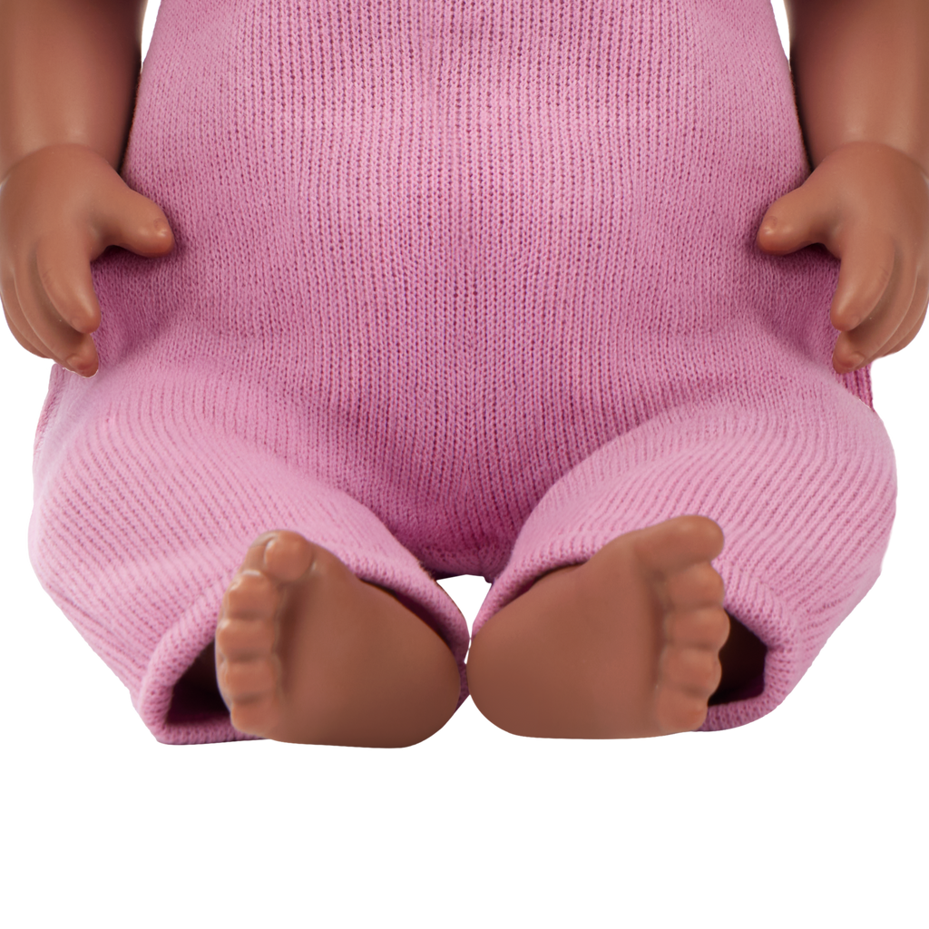LullaBaby doll in purple romper