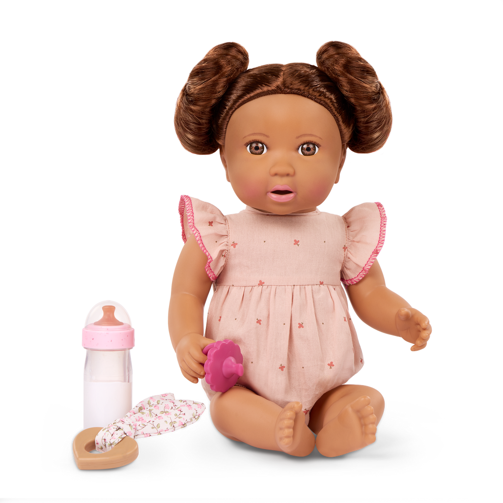 LullaBaby doll with brown hair in pink outfit
