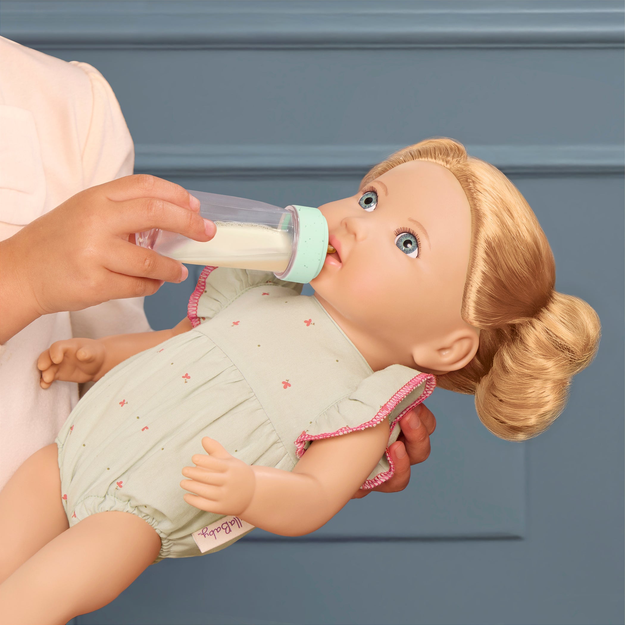 LullaBaby doll with blonde hair and blue outfit